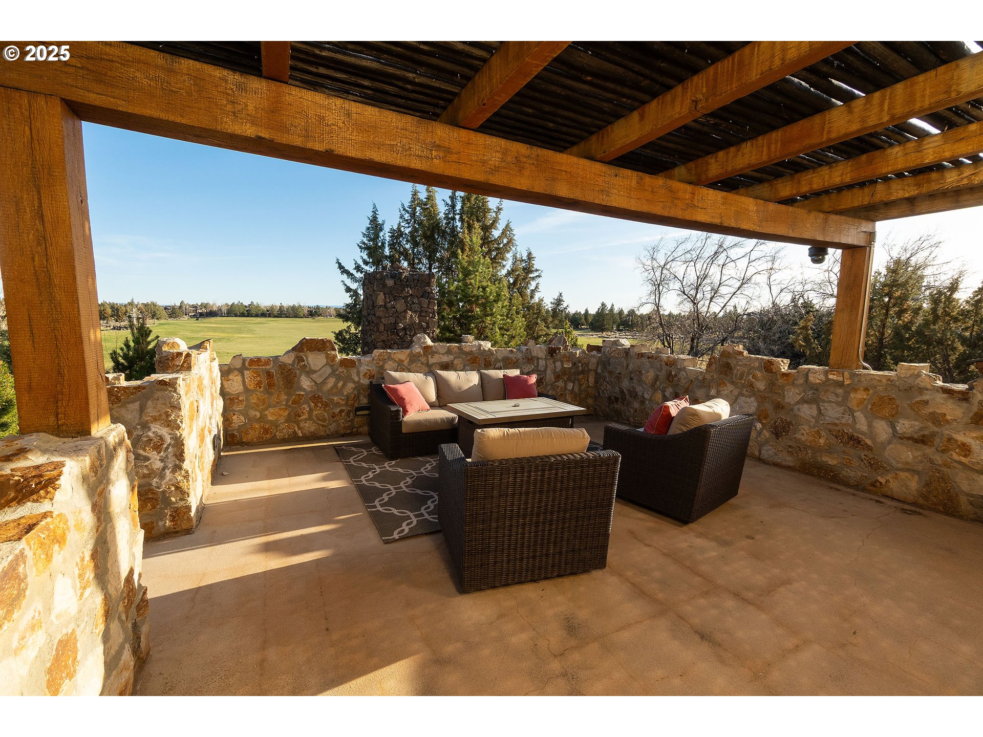 23021 Brushline Court Bend, OR 97701 - Photo 14 of 44 a outdoor living space with furniture and garden view