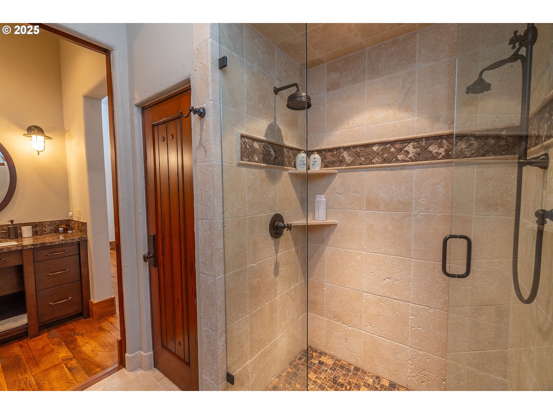 23021 Brushline Court Bend, OR 97701 - Photo 23 of 44 a bathroom with a shower and a sink
