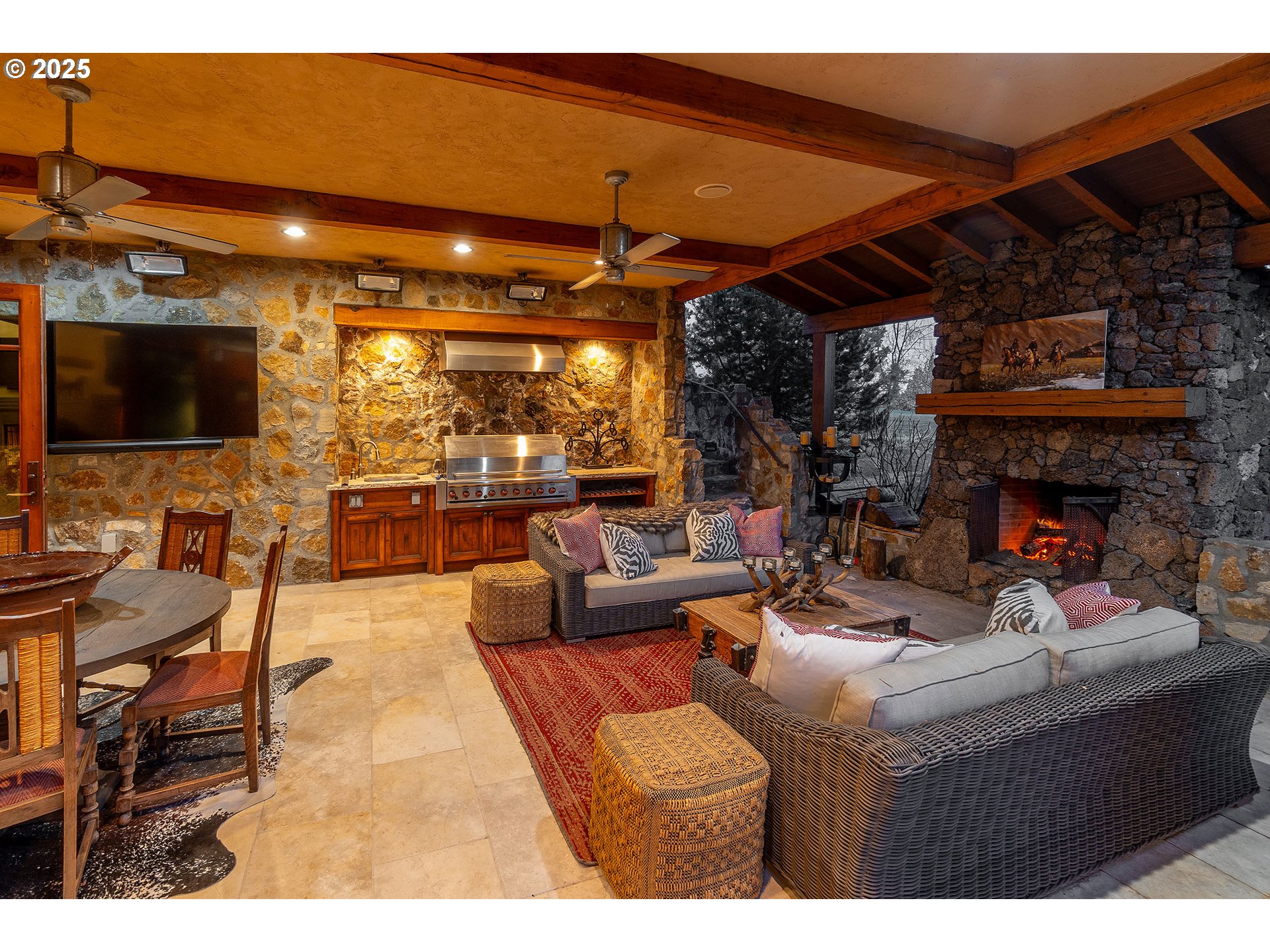 23021 Brushline Court Bend, OR 97701 - Photo 31 of 44 a living room with furniture and a flat screen tv