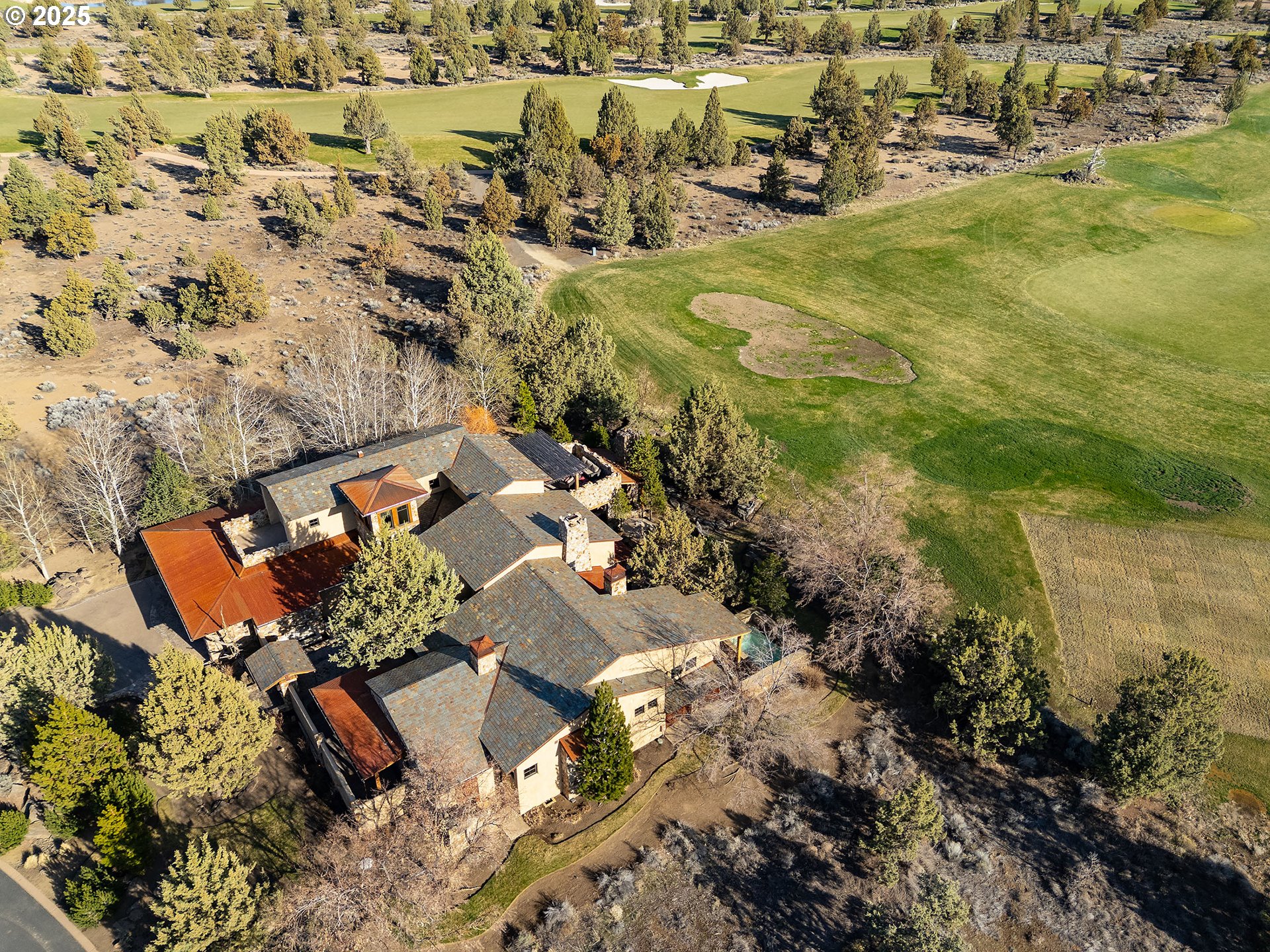 23021 Brushline Court Bend, OR 97701 - Photo 43 of 44 an aerial view of residential houses with outdoor space