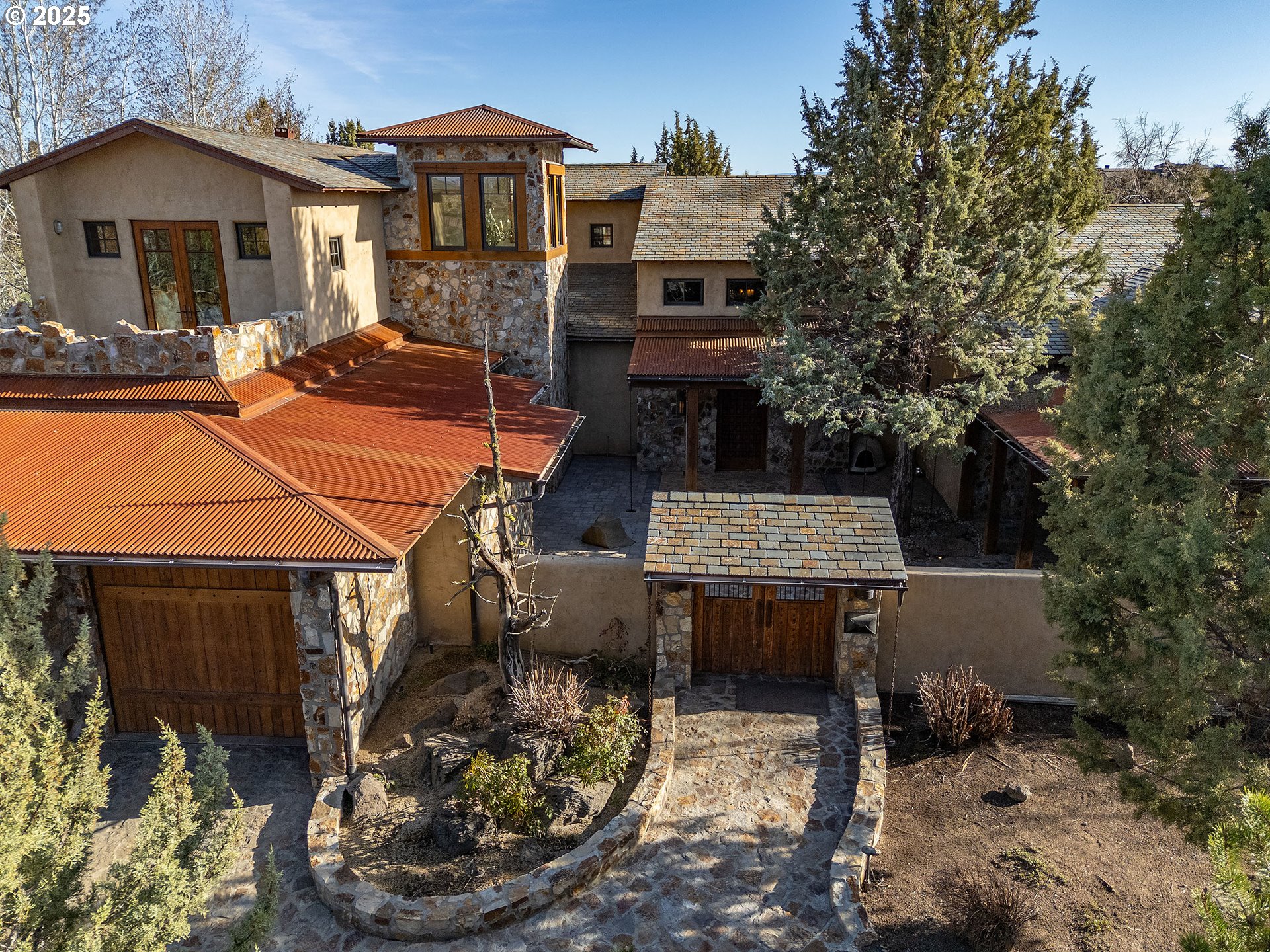 23021 Brushline Court Bend, OR 97701 - Photo 44 of 44 a front view of a house with garden