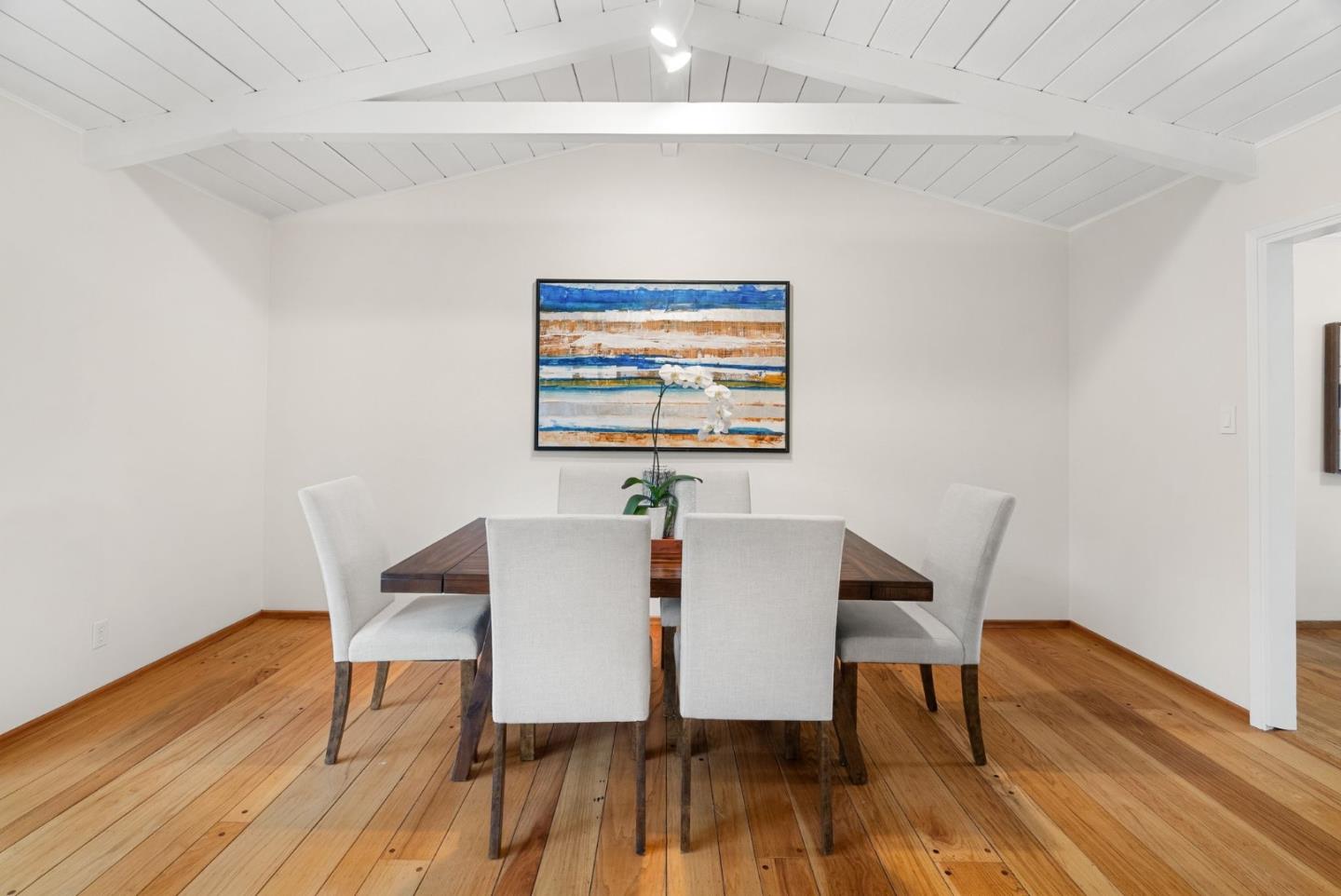 18765 Westview Drive Saratoga, CA 95070 - Photo 13 of 40 a view of a dining room with furniture and wooden floor
