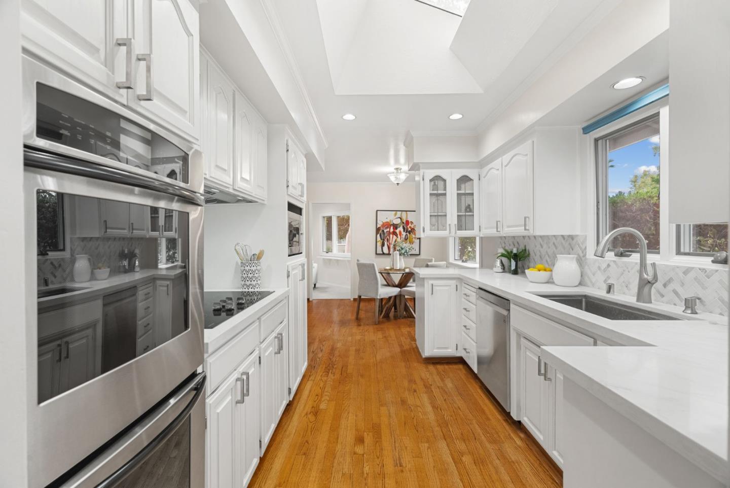 18765 Westview Drive Saratoga, CA 95070 - Photo 14 of 40 a large kitchen with stainless steel appliances lots of counter space and a sink