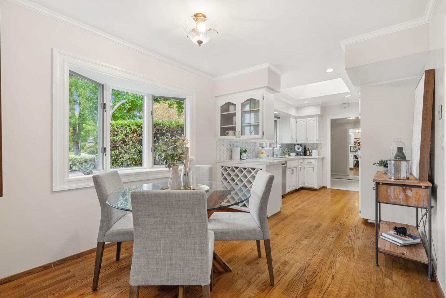 18765 Westview Drive Saratoga, CA 95070 - Photo 18 of 40 a view of a dining room with furniture and wooden floor