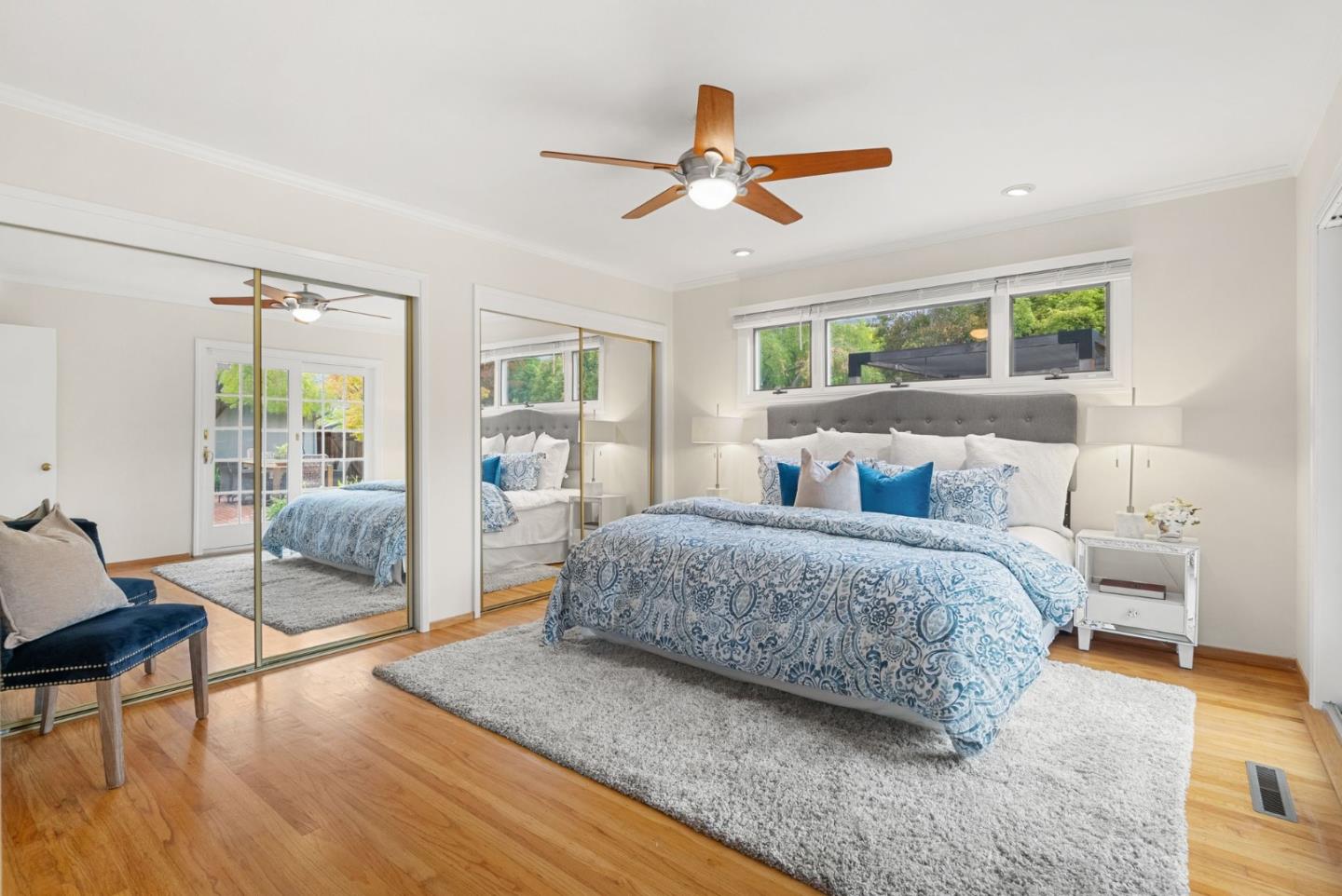 18765 Westview Drive Saratoga, CA 95070 - Photo 20 of 40 a bedroom with a bed and wooden floor