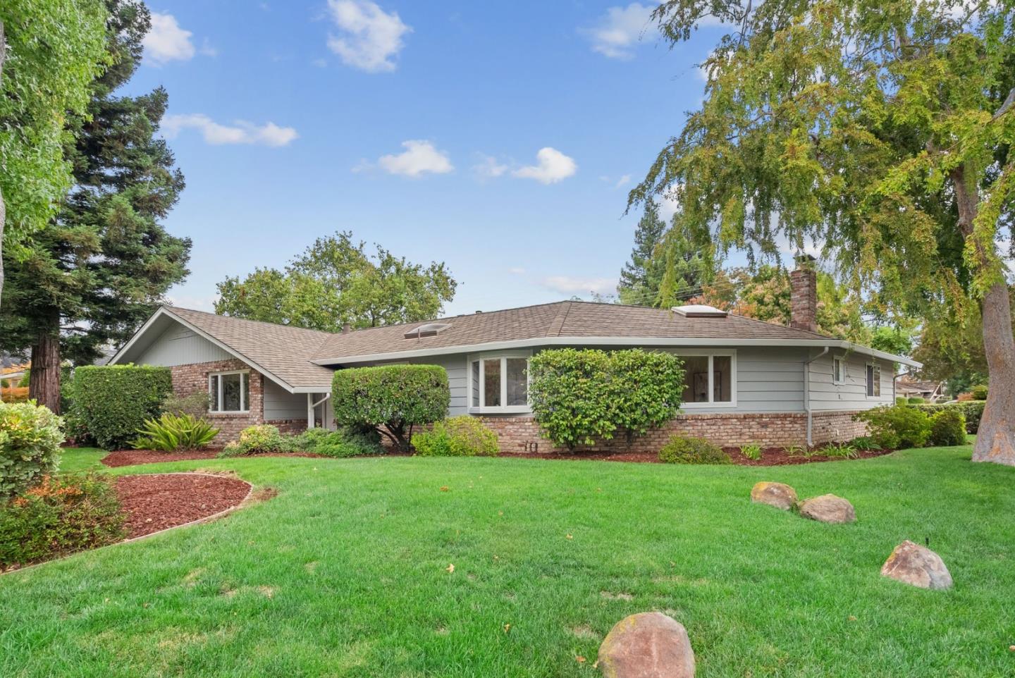 18765 Westview Drive Saratoga, CA 95070 - Photo 26 of 40 a front view of house with yard and green space