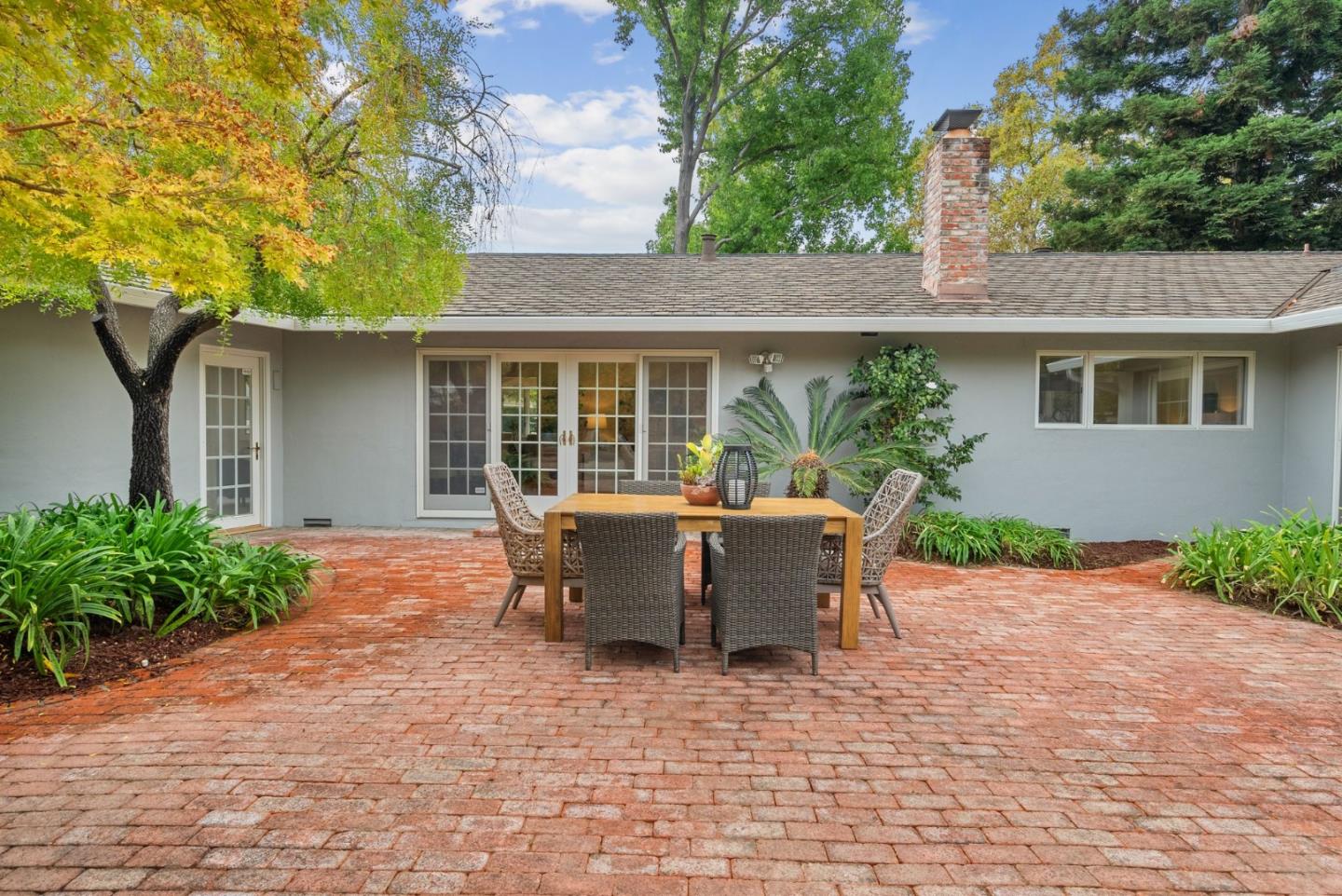 18765 Westview Drive Saratoga, CA 95070 - Photo 28 of 40 a view of a house with backyard and sitting area