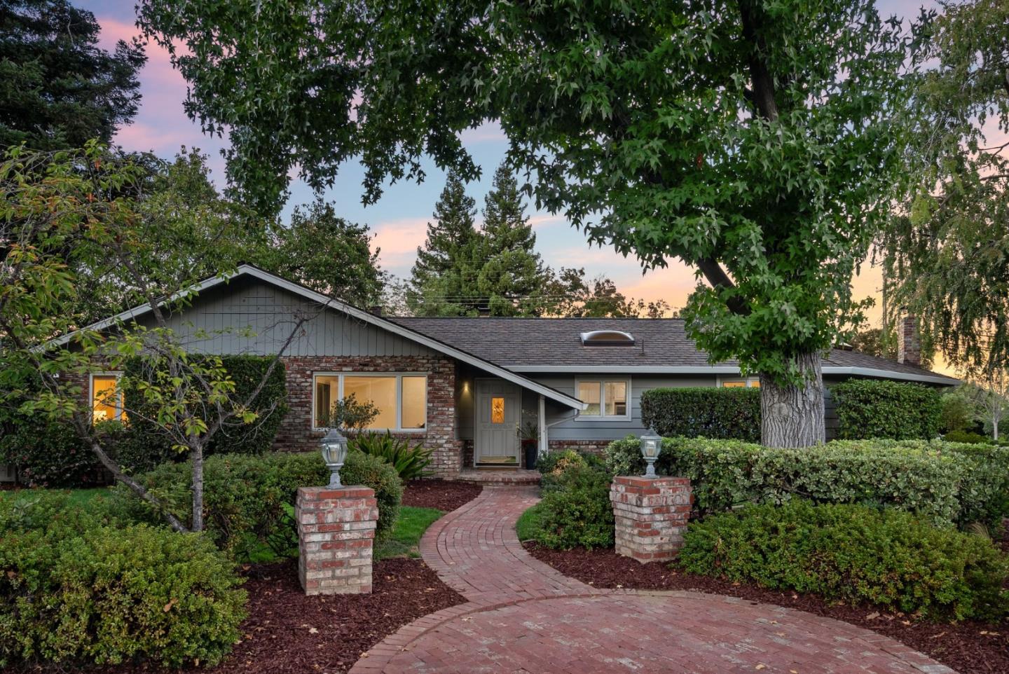 18765 Westview Drive Saratoga, CA 95070 - Photo 34 of 40 a front view of a house with garden