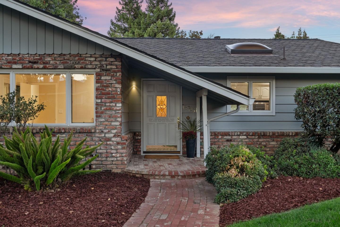 18765 Westview Drive Saratoga, CA 95070 - Photo 35 of 40 a front view of a house with garden