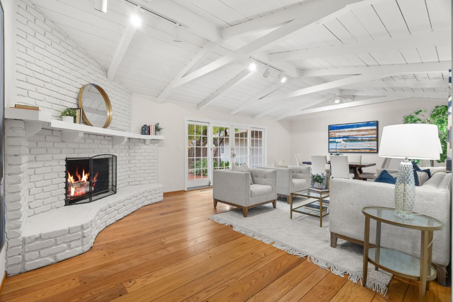18765 Westview Drive Saratoga, CA 95070 - Photo 4 of 40 a living room with furniture and a fireplace