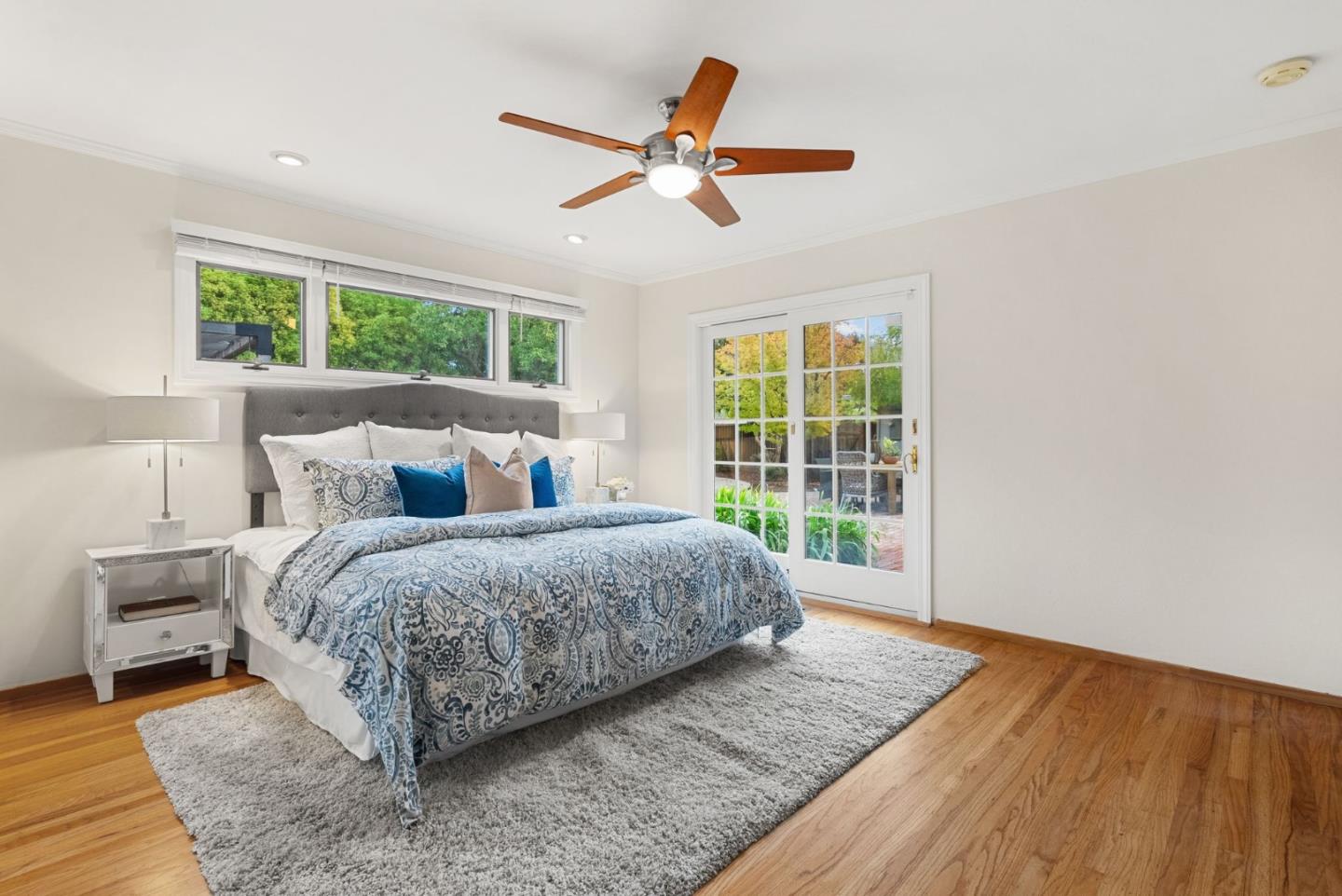 18765 Westview Drive Saratoga, CA 95070 - Photo 6 of 40 a spacious bedroom with a bed and a window