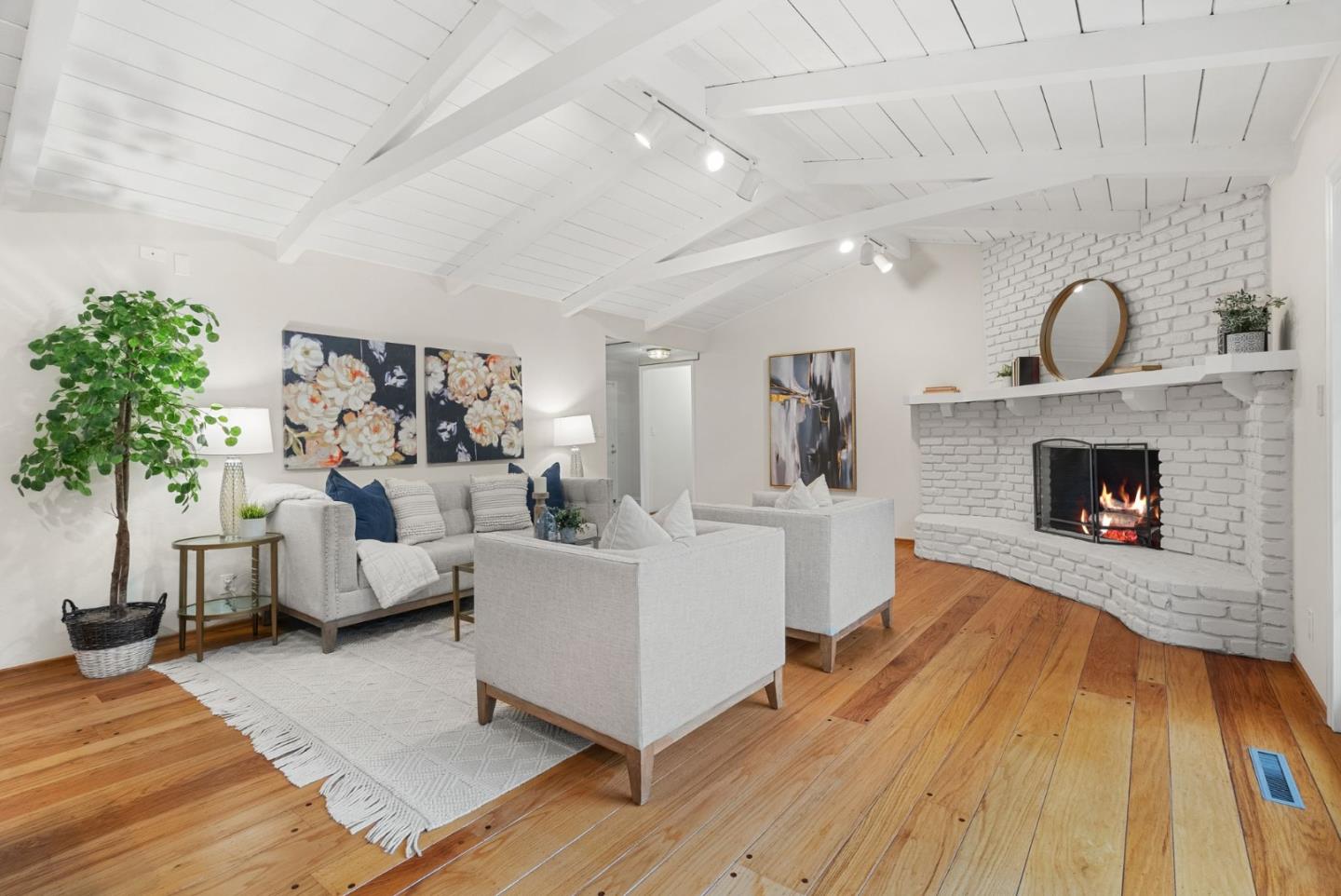 18765 Westview Drive Saratoga, CA 95070 - Photo 9 of 40 a living room with furniture and a fireplace