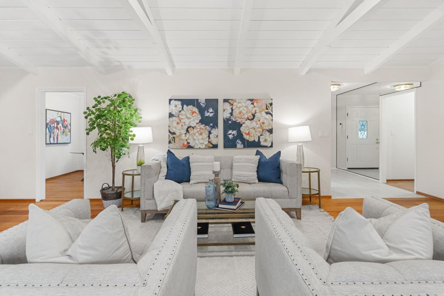 18765 Westview Drive Saratoga, CA 95070 - Photo 10 of 40 a living room with furniture and a chandelier