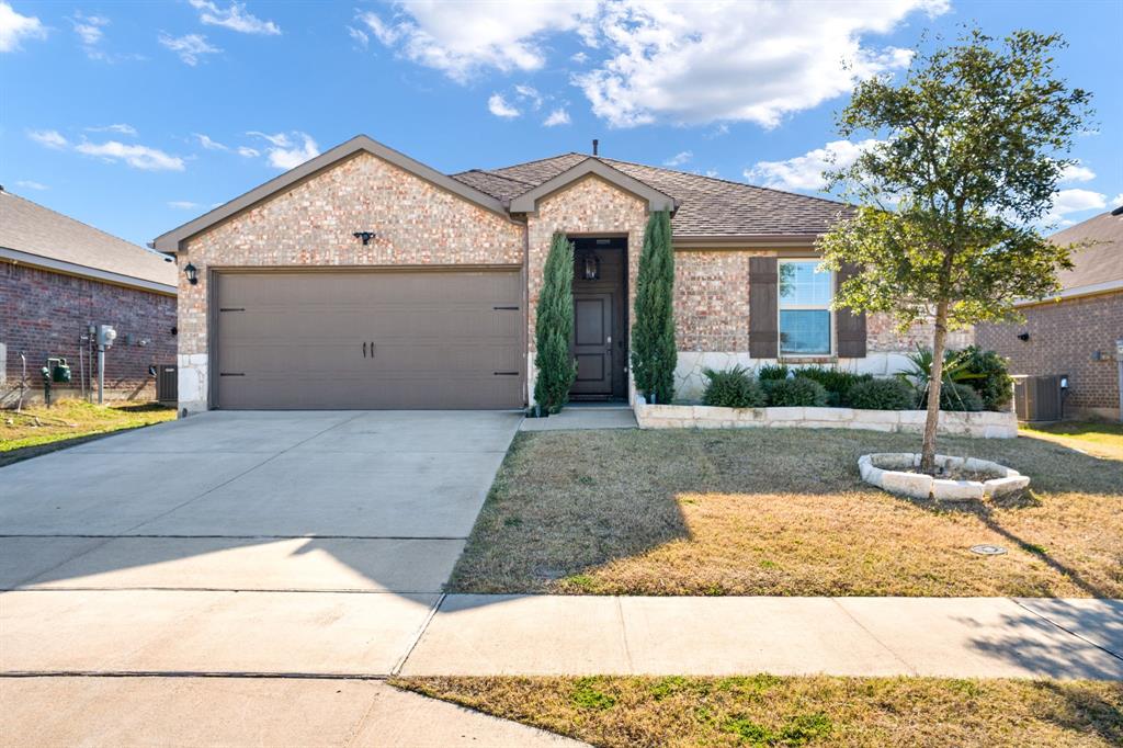 3104 Barzona Road Forney, TX 75126 - Photo 22 of 26 a front view of a house with garden