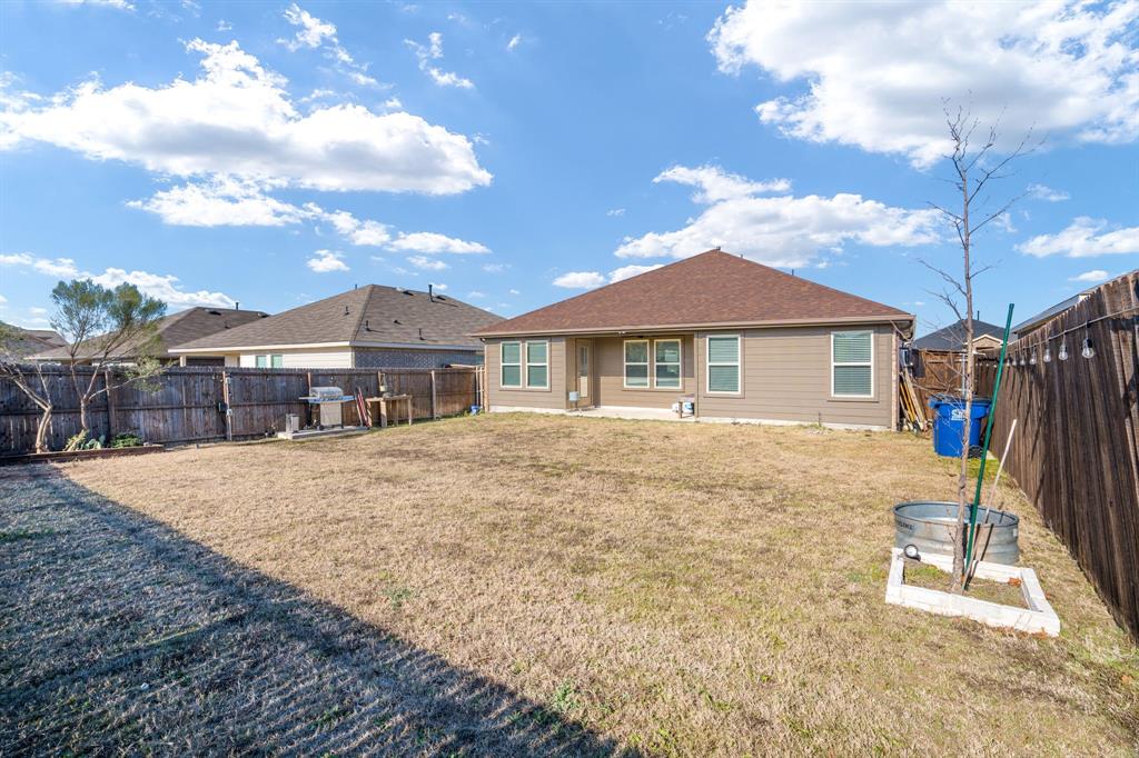 3104 Barzona Road Forney, TX 75126 - Photo 26 of 26 a front view of a house with a yard