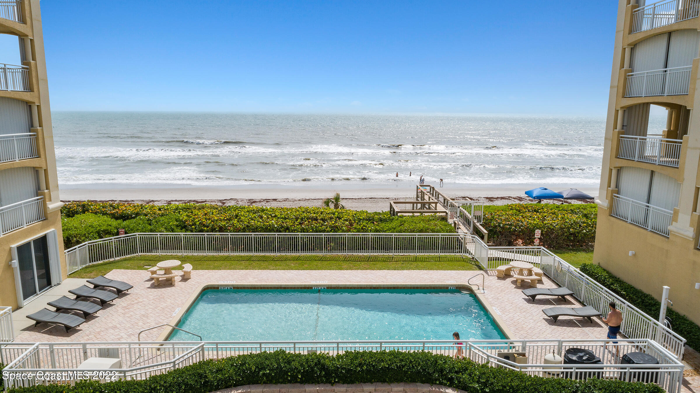 1095 Florida A1A, Unit 2301 Satellite Beach, FL 32937 - Photo 21 of 26 a view of a city with an ocean