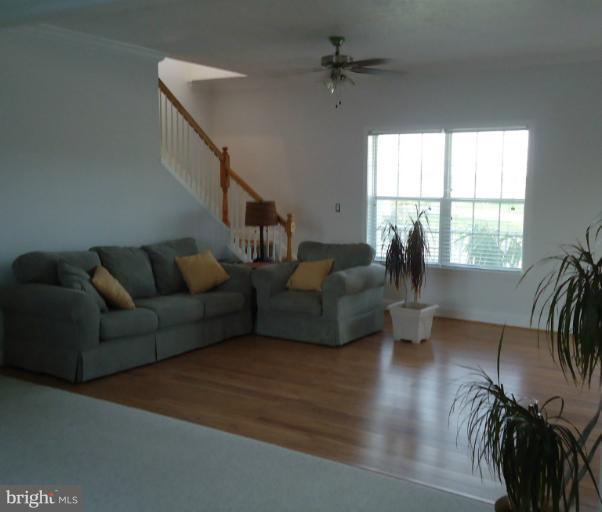 3504 Long Meadow Road Middletown, VA 22645 - Photo 2 of 28 a living room with furniture and a large window