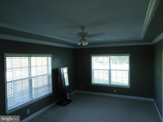 3504 Long Meadow Road Middletown, VA 22645 - Photo 12 of 28 wooden floor in an empty room with a window