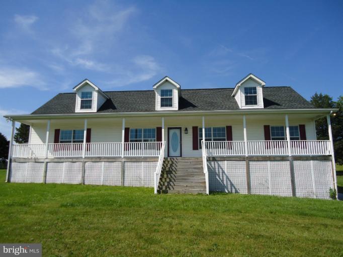 3504 Long Meadow Road Middletown, VA 22645 - Photo 26 of 28 a front view of a house with a yard