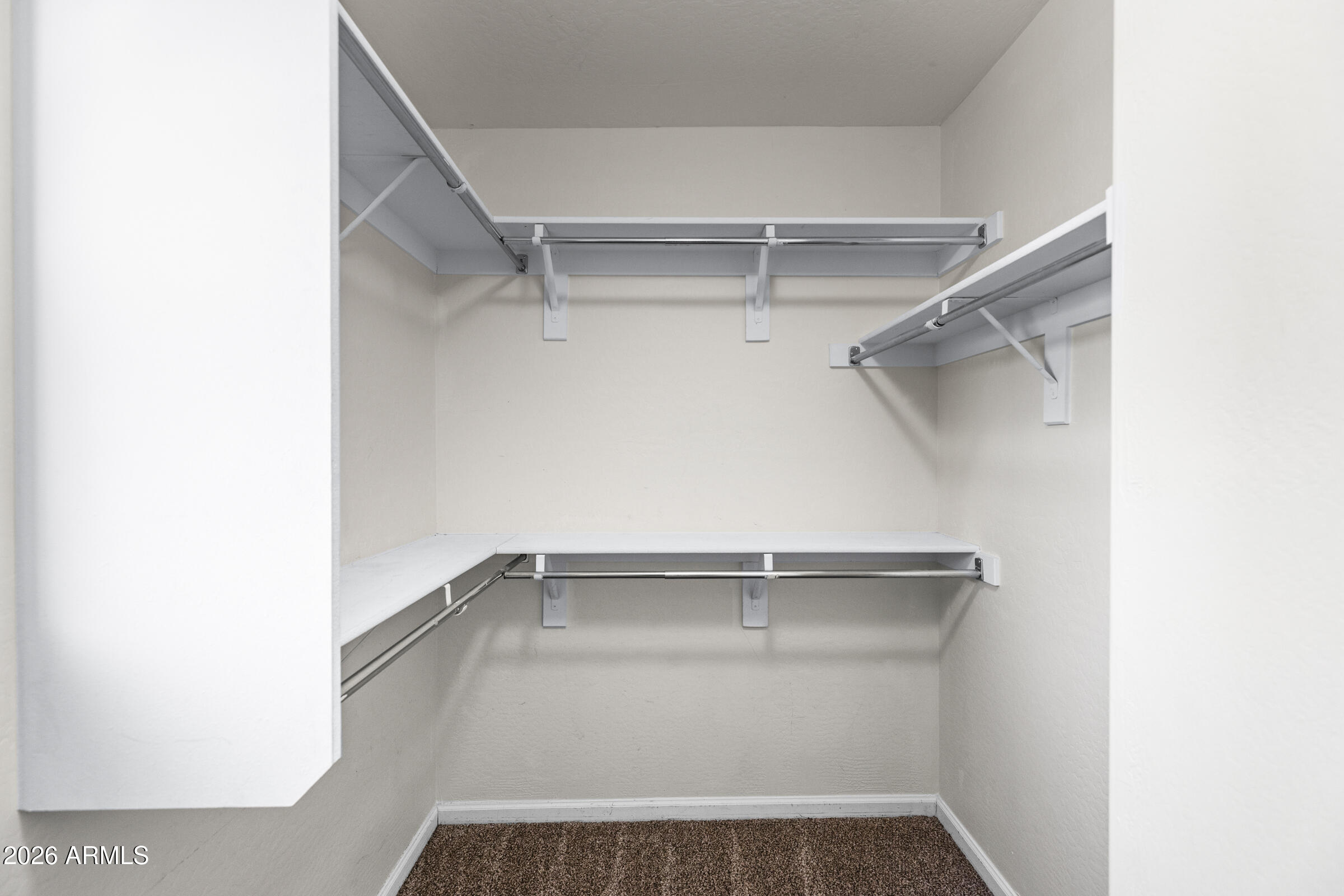 3029 East Franklin Avenue Gilbert, AZ 85295 - Photo 21 of 38 a view of a room with racks on the wall