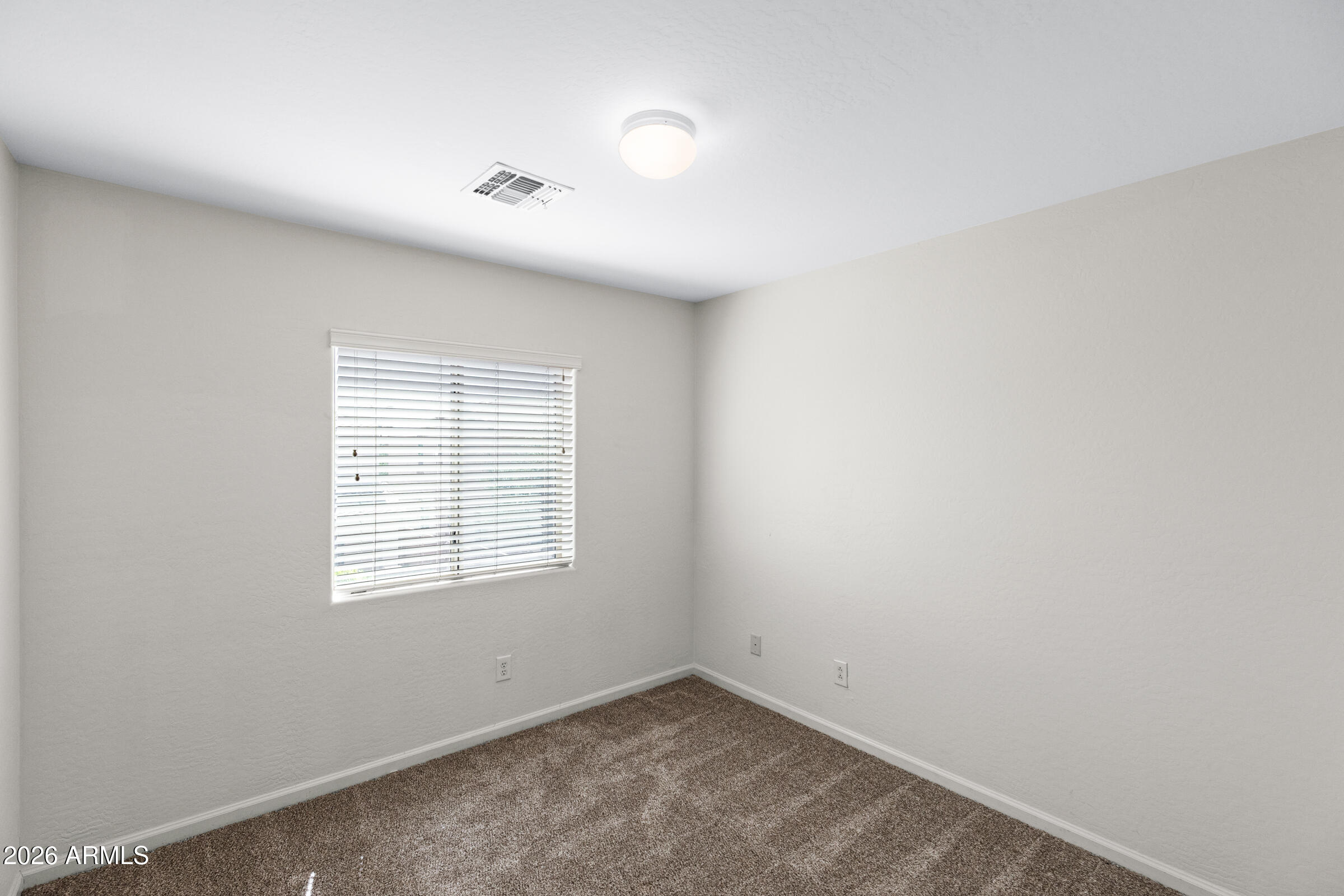 3029 East Franklin Avenue Gilbert, AZ 85295 - Photo 22 of 38 an empty room with a empty space and windows