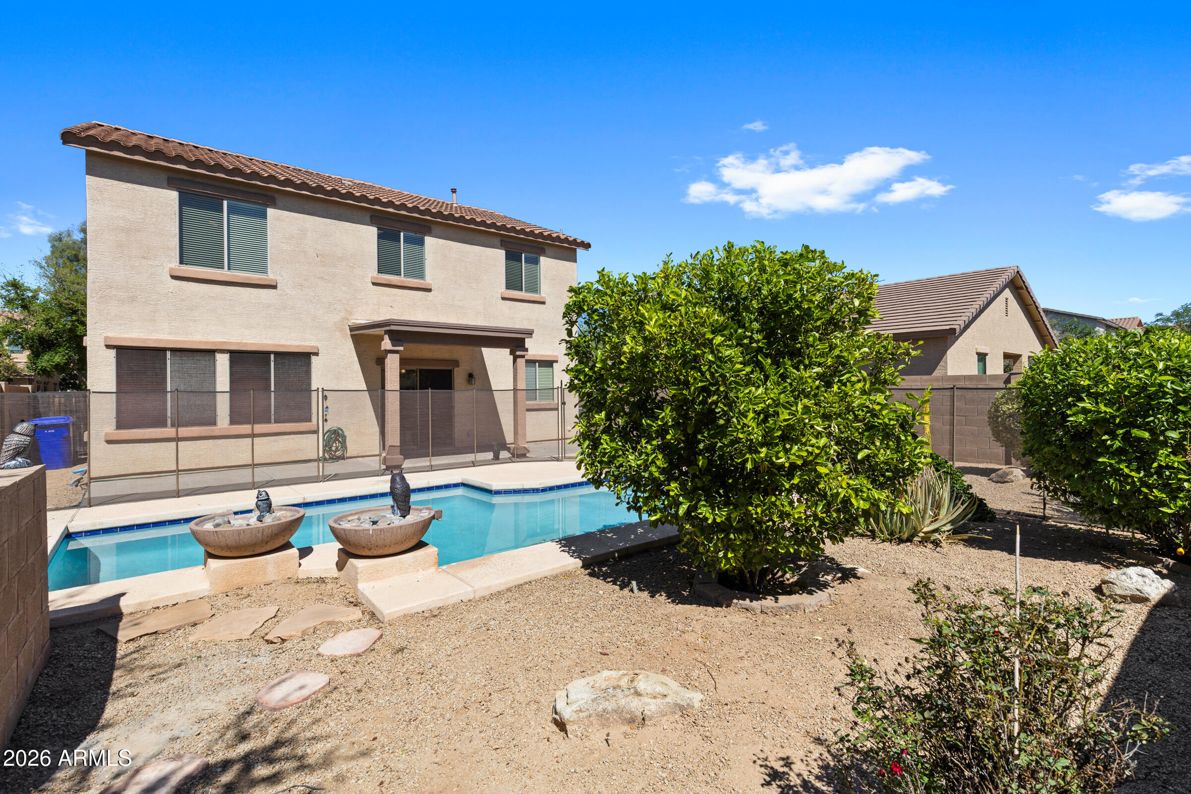 3029 East Franklin Avenue Gilbert, AZ 85295 - Photo 28 of 38 a front view of a house with a yard