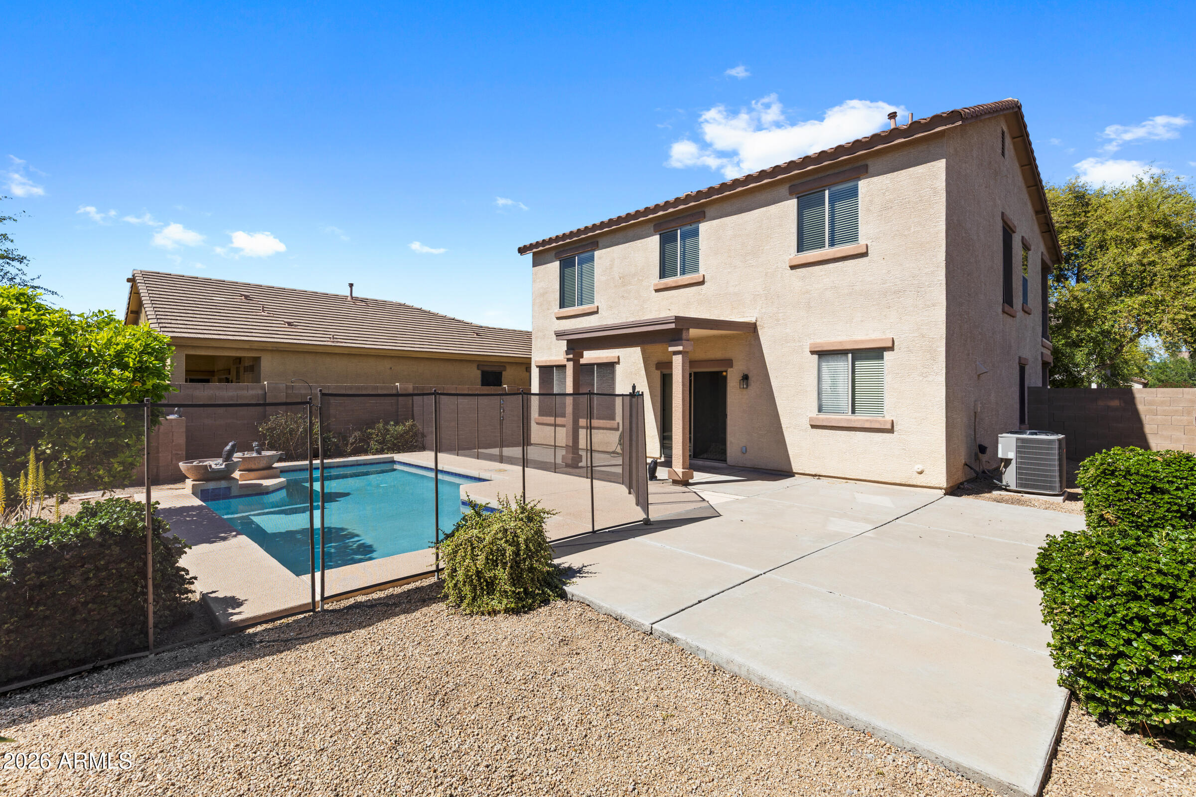 3029 East Franklin Avenue Gilbert, AZ 85295 - Photo 30 of 38 a view of a house with backyard and sitting area