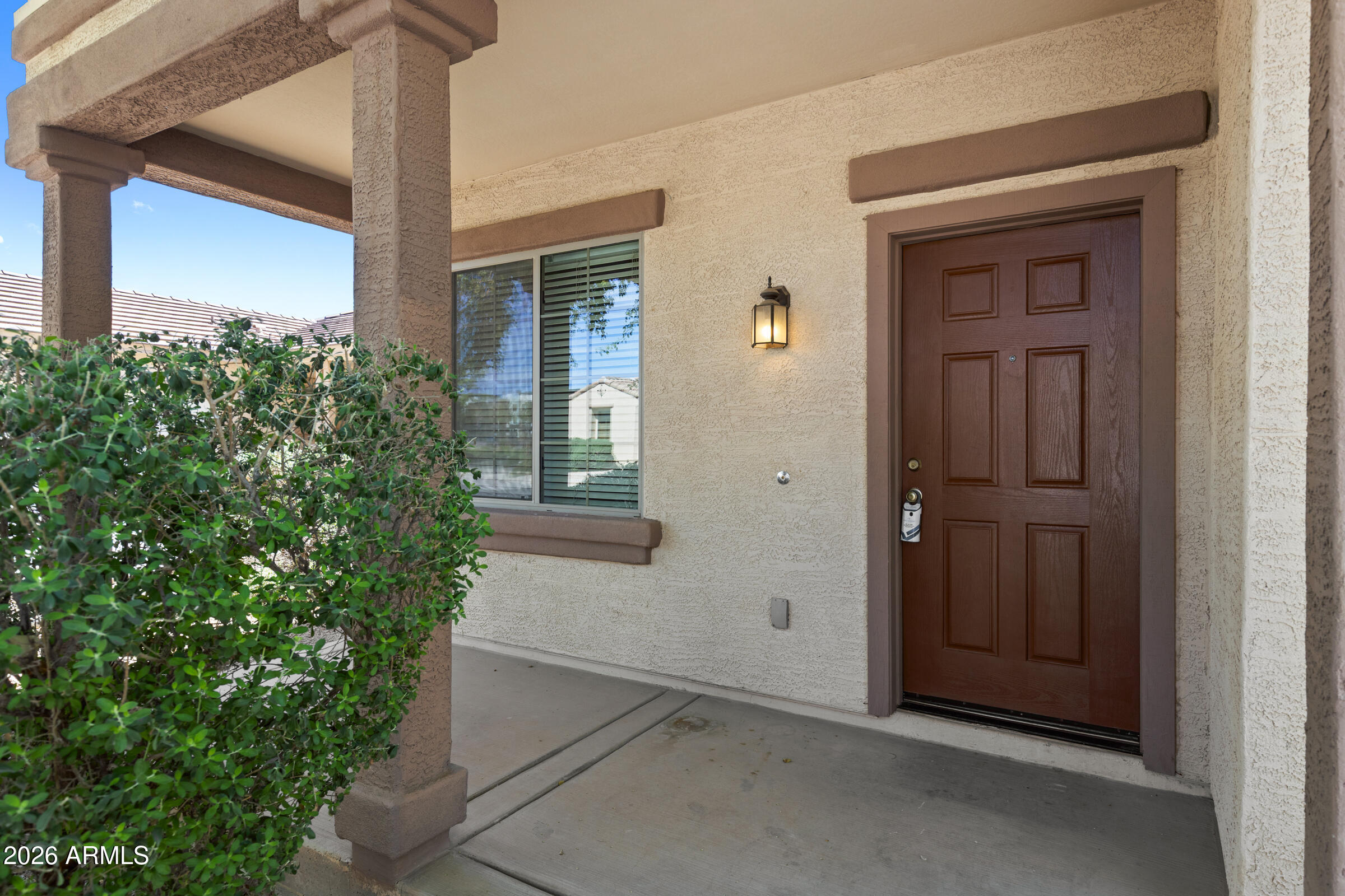 3029 East Franklin Avenue Gilbert, AZ 85295 - Photo 3 of 38 front view of a house with a yard