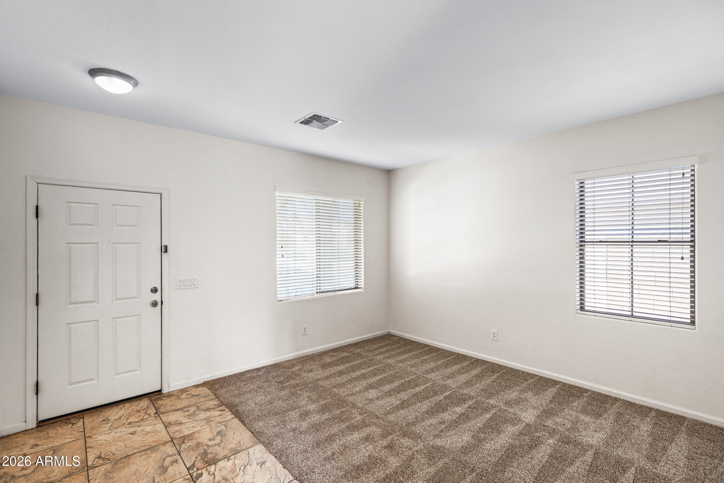 3029 East Franklin Avenue Gilbert, AZ 85295 - Photo 5 of 38 a view of empty room with window