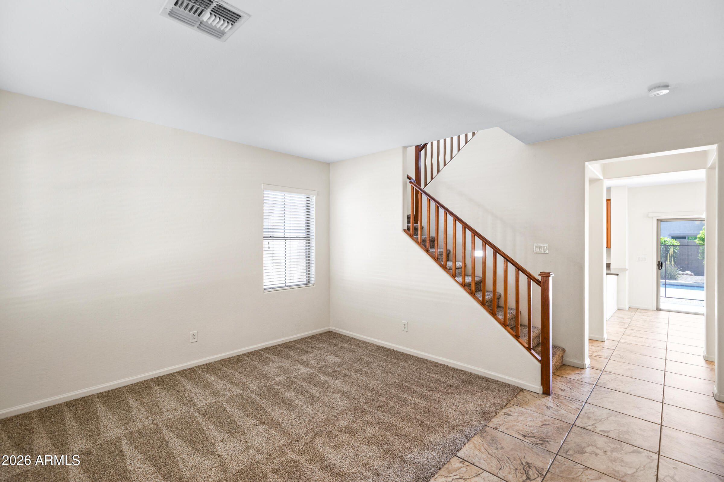3029 East Franklin Avenue Gilbert, AZ 85295 - Photo 6 of 38 a view of an entryway with wooden floor