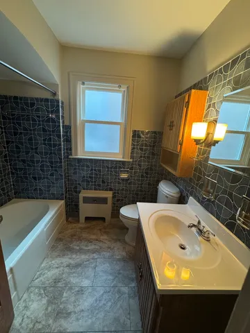 a bathroom with a sink and a bathtub