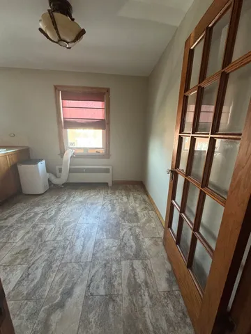 a view of livingroom with furniture and windows