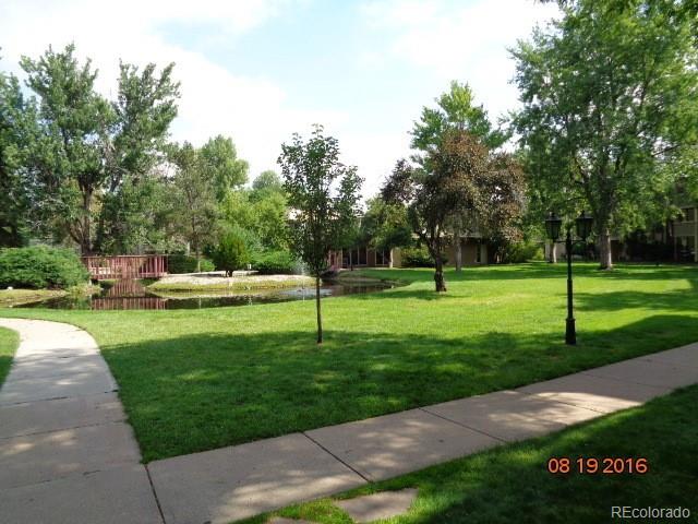 1302 South Parker Road, Unit 216 Denver, CO 80231 - Photo 7 of 13 a view of a park with trees