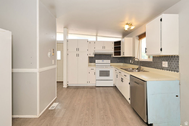 669 Colonial Avenue Layton, UT 84041 - Photo 9 of 51 Kitchen featuring wood-finish flooring, white cabinetry, a hexagonal tile backsplash, a stainless steel sink, and a stainless steel dishwasher