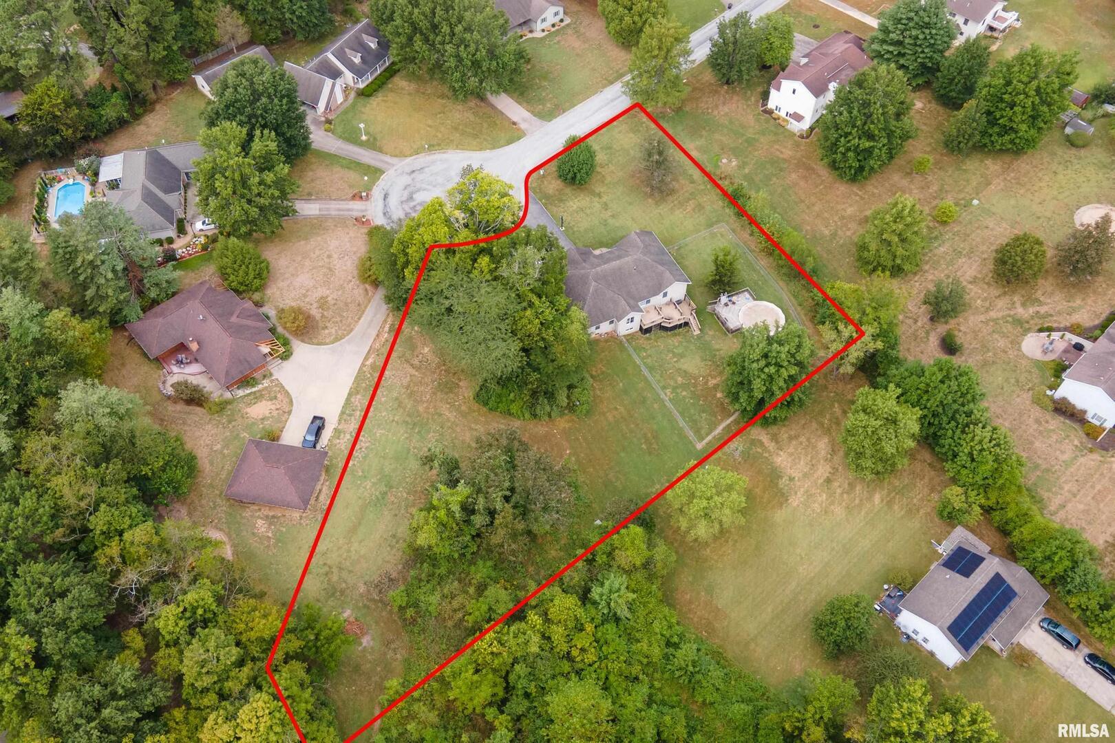 186 Bonnie Brae Road Carbondale, IL 62901 - Photo 43 of 47 an aerial view of a house with a yard and lake view