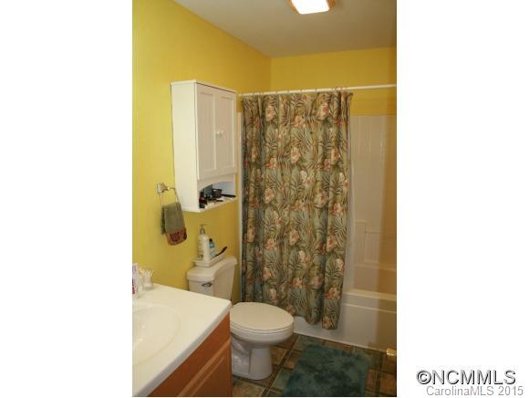 2136 Coopers Gap Road Rutherfordton, NC 28139 - Photo 12 of 24 a bathroom with a sink and a toilet