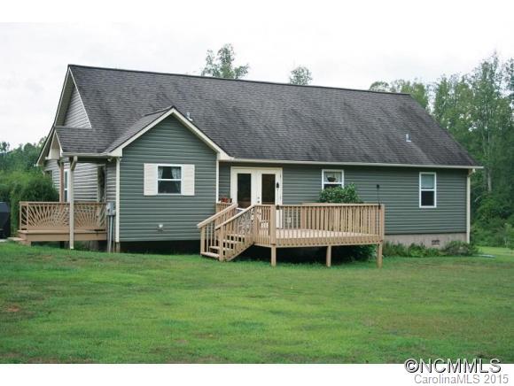 2136 Coopers Gap Road Rutherfordton, NC 28139 - Photo 24 of 24 a view of a house with a yard and deck