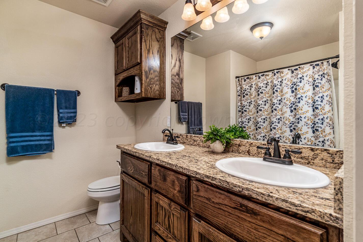 4527 Katharina Court Amarillo, TX 79110 - Photo 15 of 20 Bathroom 2