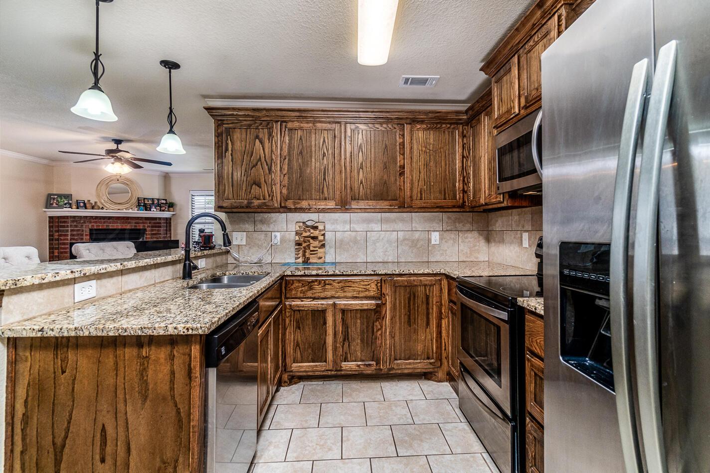 4527 Katharina Court Amarillo, TX 79110 - Photo 8 of 20 Kitchen View 2