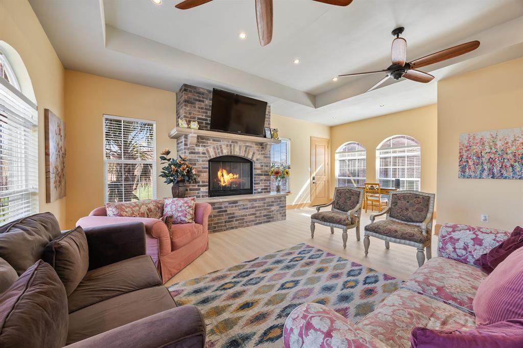 530 Ridge Point Drive Heath, TX 75126 - Photo 35 of 39 Living room in the casita with woodburning fireplace