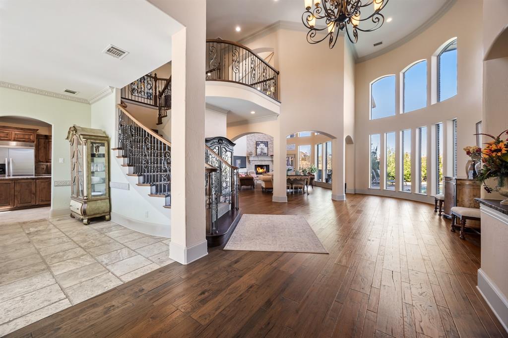 530 Ridge Point Drive Heath, TX 75126 - Photo 5 of 39 Stunning entryway with soaring ceilings and showcase staircase!