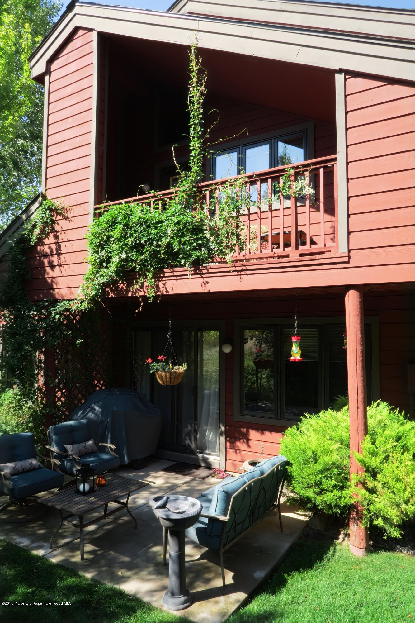 105 Silverado Drive Basalt, CO 81621 - Photo 3 of 13 a couple of table and chairs in front of house