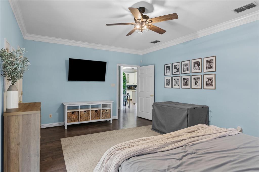 176 County Road 3282 Quitman, TX 75783 - Photo 17 of 35 a bedroom with a bed and a flat screen tv