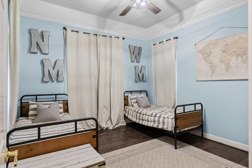 176 County Road 3282 Quitman, TX 75783 - Photo 20 of 35 a bedroom with a bed and wooden floor