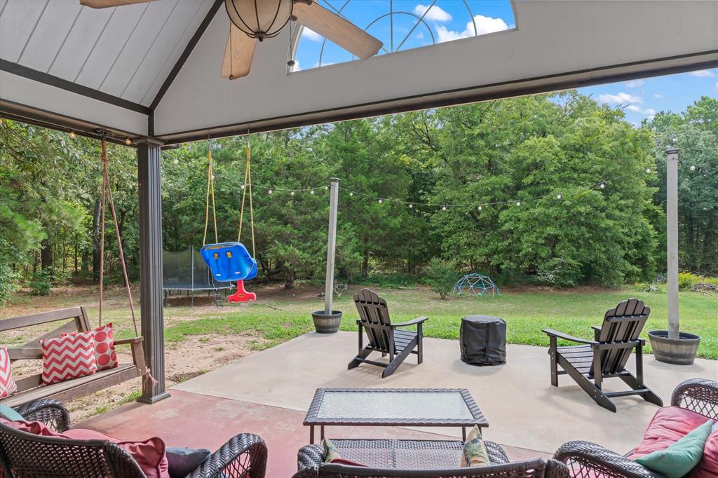 176 County Road 3282 Quitman, TX 75783 - Photo 27 of 35 a view of a patio with furniture