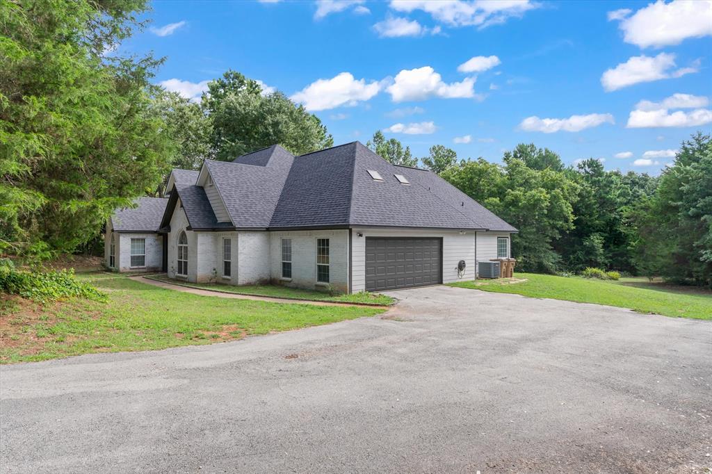 176 County Road 3282 Quitman, TX 75783 - Photo 30 of 35 a view of outdoor space yard and front view of house