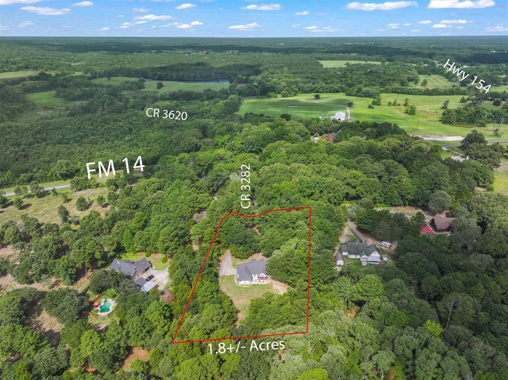 176 County Road 3282 Quitman, TX 75783 - Photo 33 of 35 a view of a green field with lots of trees