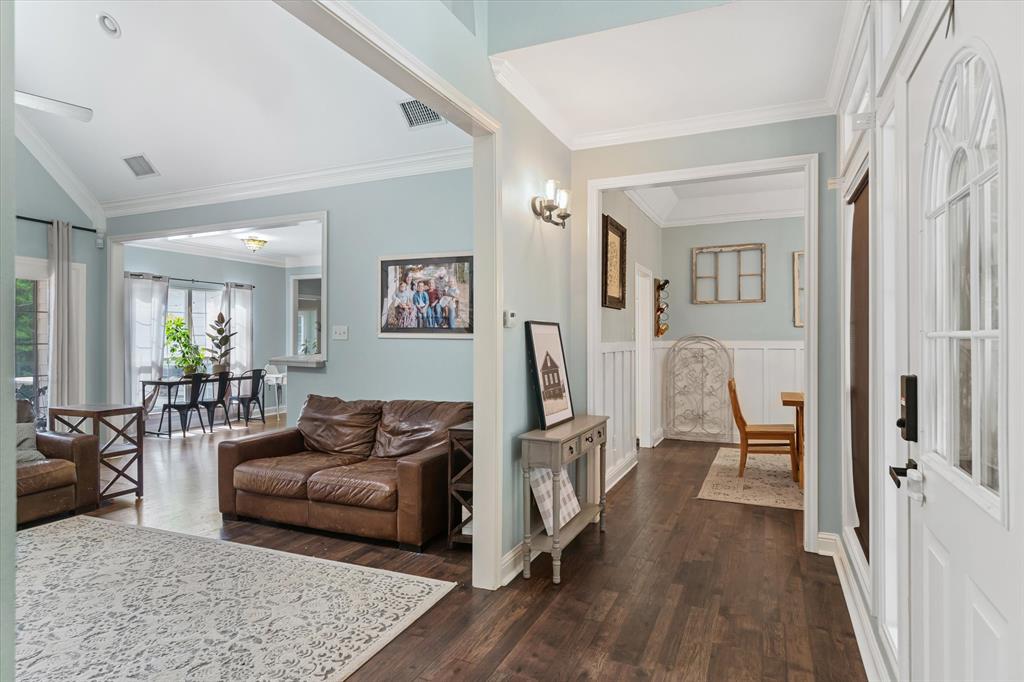 176 County Road 3282 Quitman, TX 75783 - Photo 4 of 35 a living room with furniture and a wooden floor