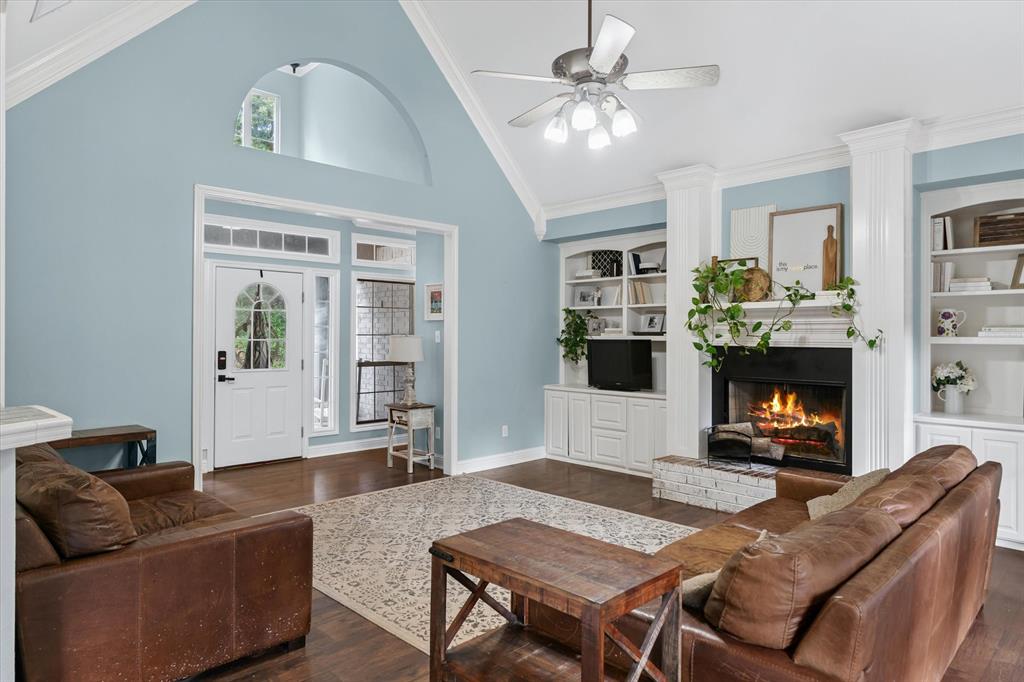 176 County Road 3282 Quitman, TX 75783 - Photo 7 of 35 a living room with furniture and a fireplace