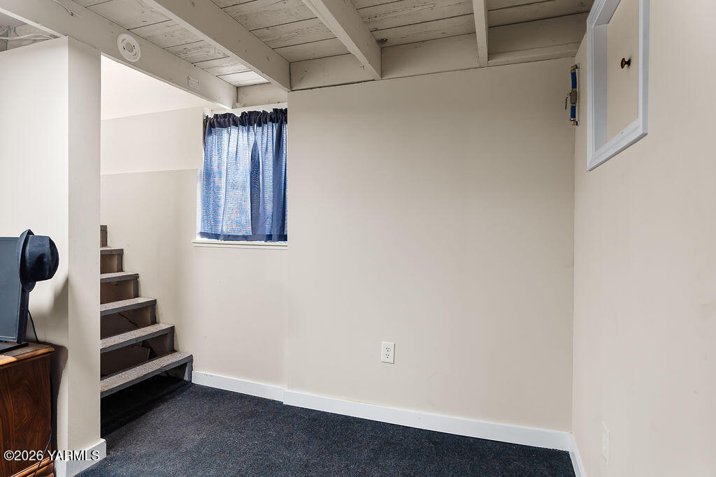603 Cornell Avenue Yakima, WA 98902 - Photo 19 of 25 a view of walk in closet with clothes and shoes